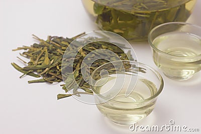 Close-up of hot green tea LongJing in cups. Dragon Well Tea Stock Photo