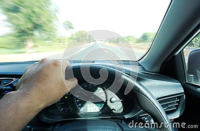 Man driving car from rear view on the highway Stock Photo