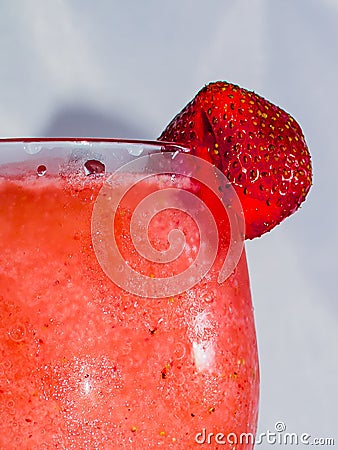 Close up of an Ice Cold Strawberry Garnish Stock Photo