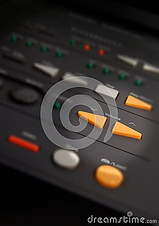 Close up on illuminated orange volume buttons Stock Photo