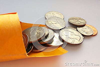 American quarters usa in a bag on light background Stock Photo