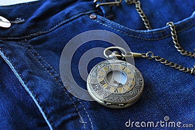 Antique Pocket Watch and Jeans Stock Photo