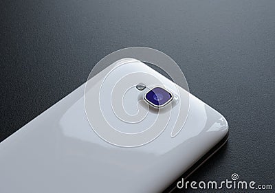 Close Up Image of the Camera of White Smart Phone on Black Table Stock Photo