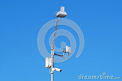 Close up image of CCTV security camera fixed on a pole metalic . Stock Photo