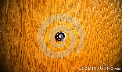 Close up image of a door peephole. Stock Photo
