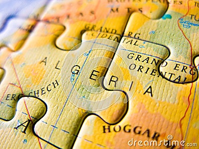 Close up of a jigsaw puzzle map depicting Algeria Editorial Stock Photo