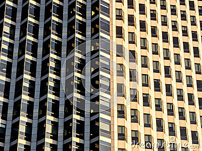 Close up image of modern skyscapter facade, many office windows, business concept Stock Photo