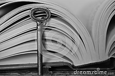Antique Key and Open Book Stock Photo