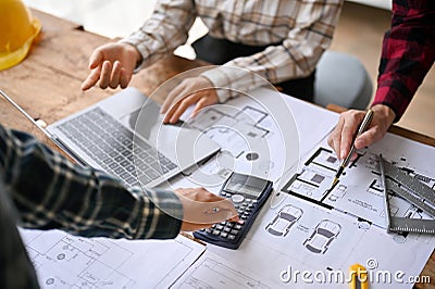 Close-up image of professional engineers are discussing in the office Stock Photo