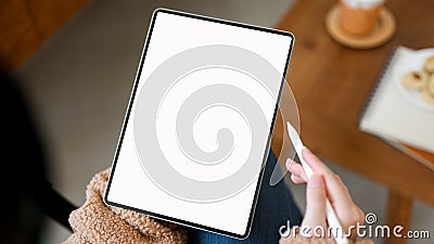 Close-up image, Relaxed female using digital tablet touchpad Stock Photo