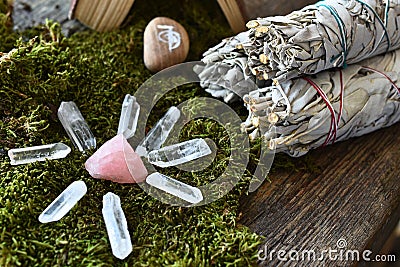 Rose Quartz Crystals and White Sage Smudge Sticks Stock Photo