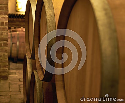 Close up image of wine barrels in a wine cellar Stock Photo