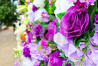 Close-up images focus on some purple flowers in the bouquet. Stock Photo