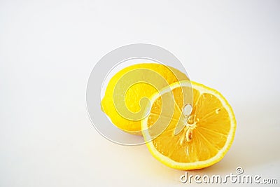 Close-up of incised lemons in the white background Stock Photo