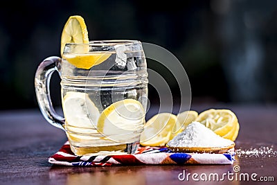 Close up of Indian most popular summer drink Nimbu pani or Nimbo sarbat,Lemonade in a transparent glass with salt Stock Photo