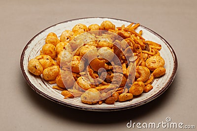 Close up of Indian Spicy Chatpata Mixture of makhana and dry fruits namkeen. Stock Photo