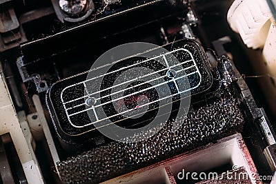 Close-up inkjet printer print head. View from top. Background for service of repair and maintenance of printers and Stock Photo