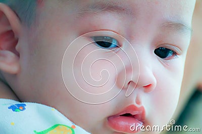 Close up of innocent face of young baby Stock Photo