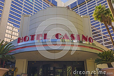 Close-up of inscription Hotel Casino above entrance to building hotel Flamingo. Editorial Stock Photo