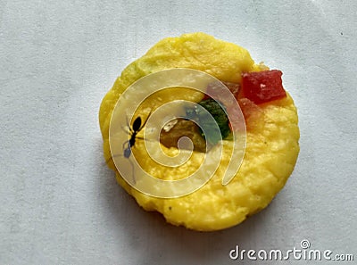 Close up of insects on Indian sweet peda or pedha Stock Photo