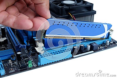 Close up installing ram and motherboard Stock Photo