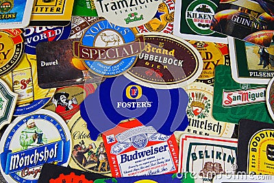 Close up of international beer coaster boards from all over the world Editorial Stock Photo
