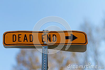 A close up isolated ` Dead End ` road sign with blurred background Stock Photo