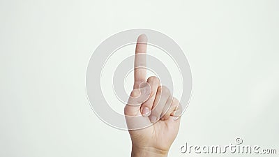 Close up of female hand shows index finger up isolated on white background Stock Photo