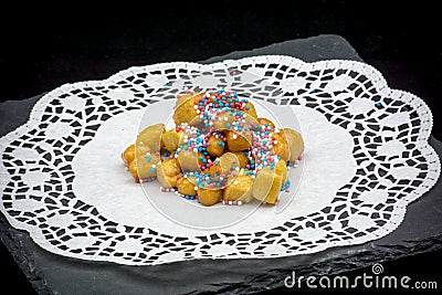 Close Up Of Italian Traditional Food Called Strufoli On Black Ba Stock Photo