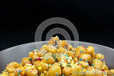 Close Up Of Italian Traditional Food Called Strufoli On Black Ba Stock Photo