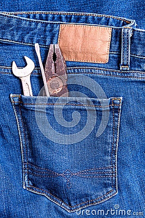 Close up of Jeans back pocket with workman tool Stock Photo