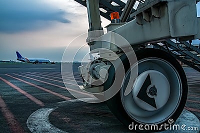 close up of jetway wheels on the airport apron Stock Photo
