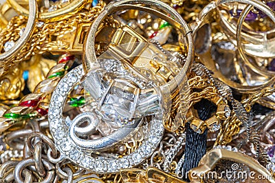 A Close-up Jumble of Beautiful Gold Jewelry Stock Photo