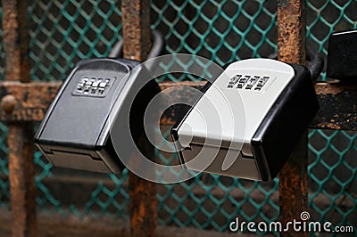 Close-up of key boxes attached to a rack Stock Photo