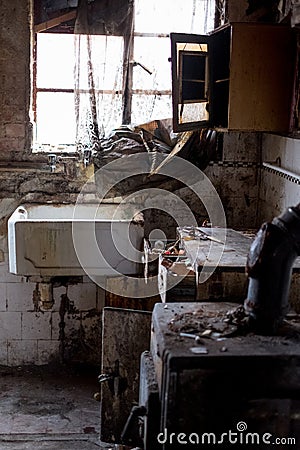 Close up of kitchen left in appalling condition in derelict house. Rayners Lane, Harrow UK Stock Photo