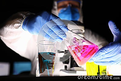 Man mixing two colours together Stock Photo