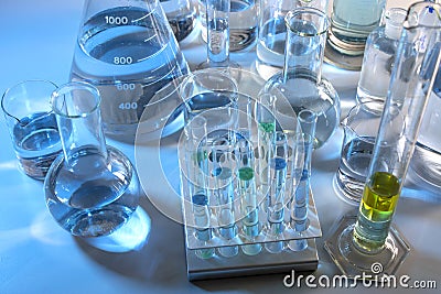 Close up of labware such as beaker, flask, graduated cylinders and test tubes well placed Stock Photo