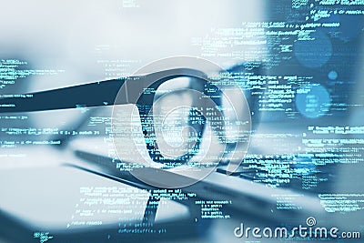 Close up of laptop on desk with glasses, smartphone and creative coding html language on blurry background. Web developer and Stock Photo
