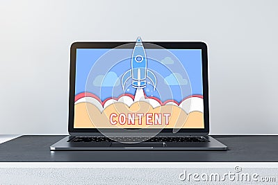 Close up of laptop with spaceship cartoon and content concept at office workplace. Content marketing concepts for web banner and Stock Photo