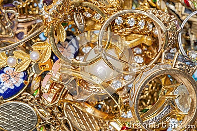 Close-up Of A Large Pile of Golden Jewelry Items Stock Photo
