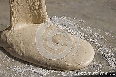 Close up of leavened dough for pizza on marble Stock Photo