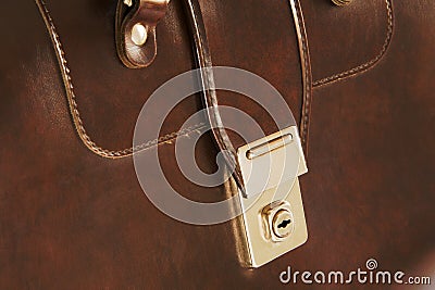 Lock on leather business briefcase Stock Photo
