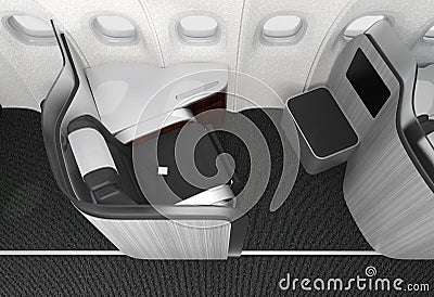 Close-up of luxurious business class seat with frosted acrylic partition. Stock Photo