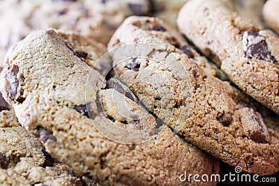 Close Up Of A Lying Pile Of Baked Cookies With Triple Chocolate, In Front Of Other Biscuits Stock Photo