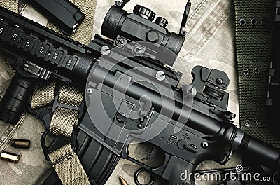 Close-up of a M4A1 weapons and military equipment for army, Assault rifle gun and pistol Stock Photo