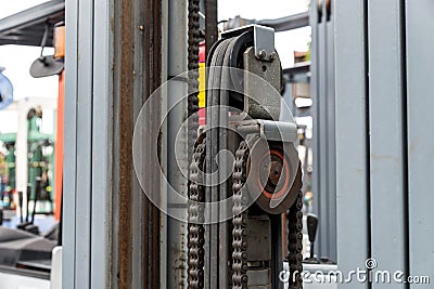 Machine engine chain with cog wheel part of forklift truck Stock Photo