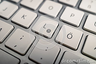 Close-up at German alphabet keypad on metal keyboard. Stock Photo