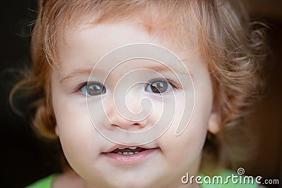 Close up macro portrait of a cute baby. Childhood and parenting concept. Stock Photo