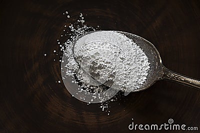 Close-up of magnesium citrate in an iron spoon. dietary concept. dietary supplement Stock Photo