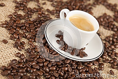 Close-up makro of espresso cup with coffee beans Stock Photo